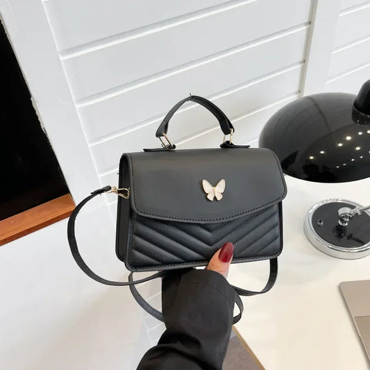 BOLSO BANDOLERA LIVIA MARIPOSA