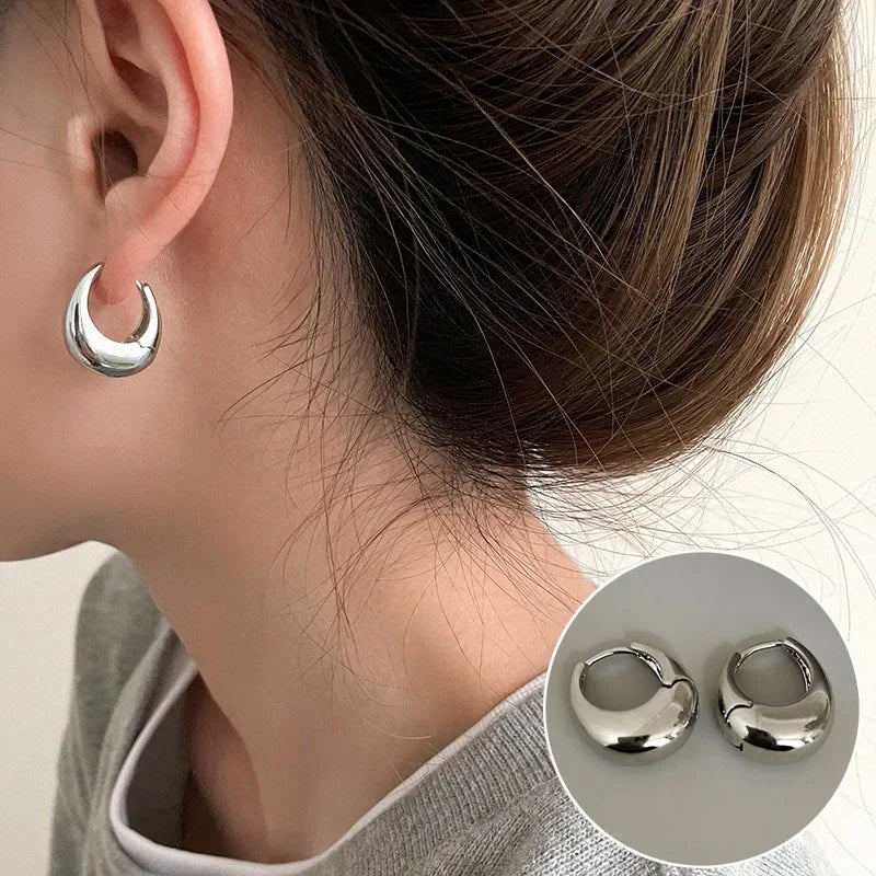 PENDIENTES DE ARO FLORA DORADOS
