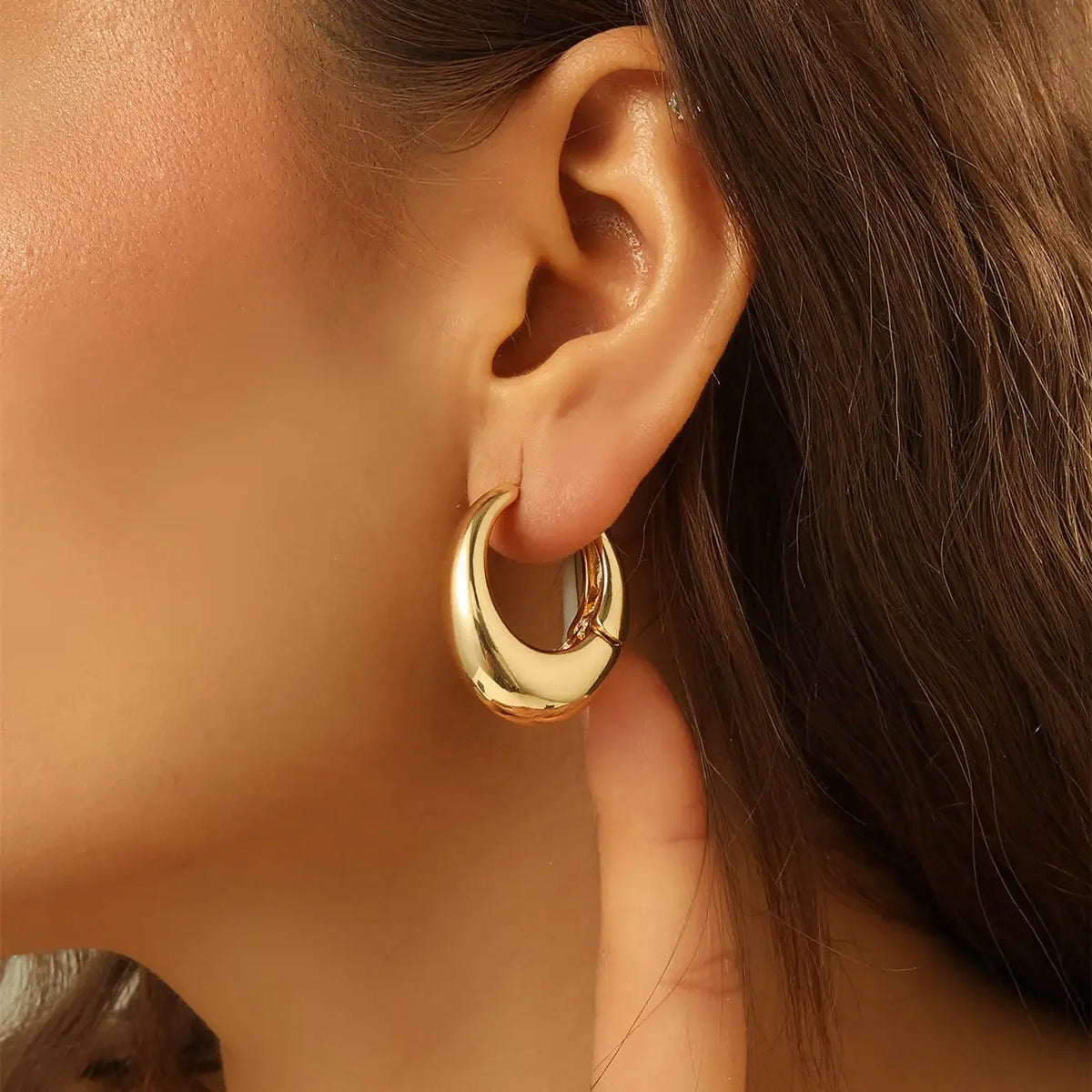 PENDIENTES DE ARO FLORA DORADOS