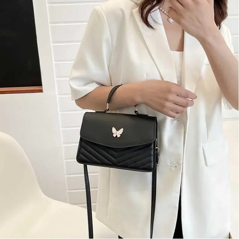 BOLSO BANDOLERA LIVIA MARIPOSA